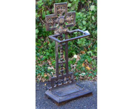 A Victorian cast metal stick stand the back with stylized floral design, with registration mark to removable tray and stand 8