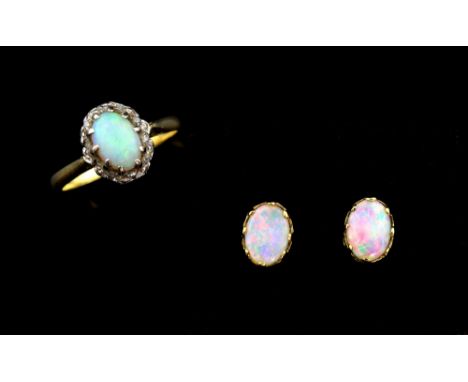 Opal and diamond cluster ring, mounted in 18 ct yellow gold and a pair of opal stud earrings in 9 ct gold.