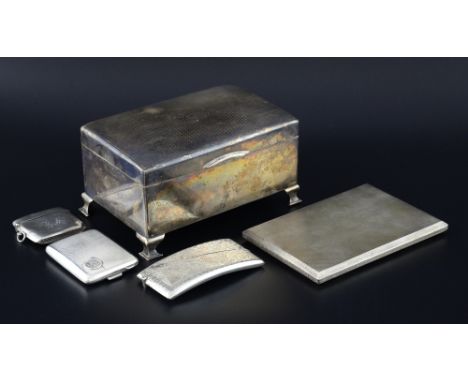 George V silver cigarette box with engine turned decoration on ogee feet, by Horton & Allday, Birmingham, 1927, cigarette cas