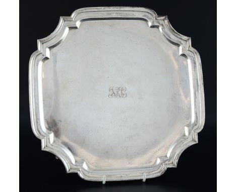 George V silver salver with shaped rim on four scroll feet, by Harrison Brothers & Howson, Sheffield, 1932, 30oz, 933g,