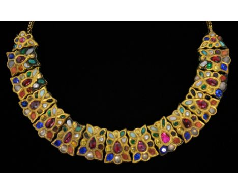 A 19th C Indian gold, gem-set and enamel necklace, comprising  a series of thirteen  rectangular shape plaques set with ruby,