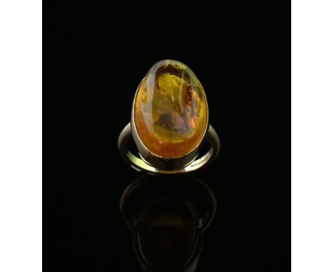 Amber ring with insect inclusion, set in 9 ct gold 