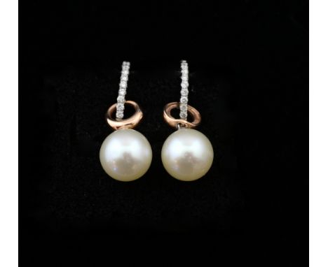 A pair of pearl, diamond and gold drop earrings, 8.40 mm cultured pearl drop and detachable diamond hoop tops. 