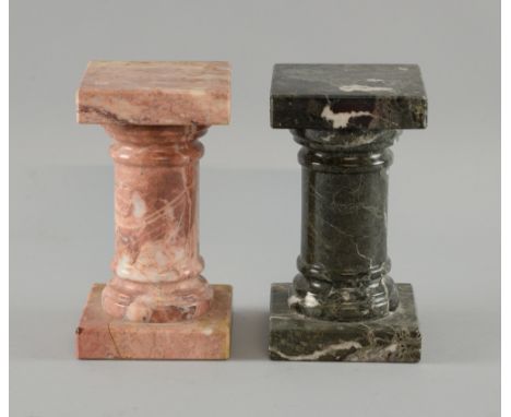 Pair of pink marble clock garnitures 20cm and two marble pillars each 16cm  