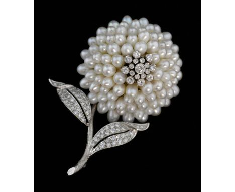 Diamond and pearl brooch, in the form of a chrysanthemum,  with petals of pear form pearls, the centre and leaves set with di