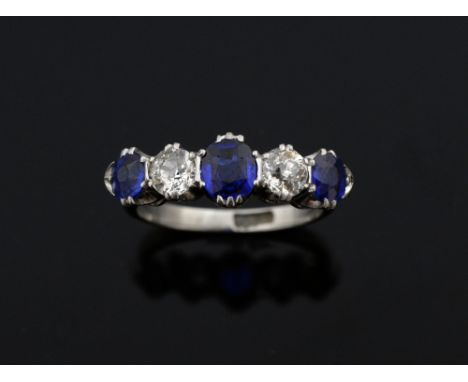 Early 20th C sapphire and diamond five stone ring, mounted in platinum, diamond weight estimated at 0.50 cts 