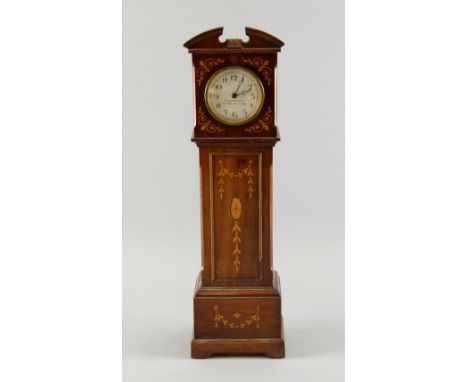 Early 20th century mahogany inlaid miniature long case clock Houghton and Gunn, New Bond Street with broken arch pediment, 38