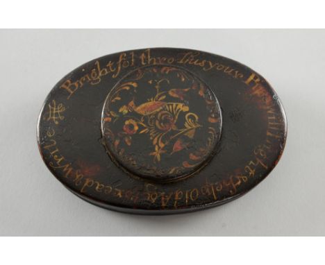 18th century Pontypool tobacco box the cover with inset magnifying glass, and inscription   Bright fol through this your pipe