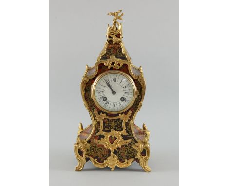 Faux Boulle and gilt brass two train mantel clock, chiming at hours and half hours on a gong. Height 35cm