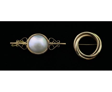 Two modern gold brooches, a mabe pearl set brooch and a gold ring  