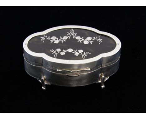 George V silver quatrefoil shaped trinket box with floral inlaid tortoisehsell cover on cabriole legs, by E. S. Barnsley & Co