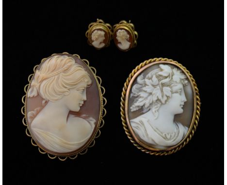 Two carved cameo brooche,s and a pair of earrings, mounted in 9 ct gold. 