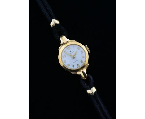 Rolex ladies 9ct gold cocktail watch, circular round dial with gold Arabic numerals, signed Rolex Precision, on a black  stra