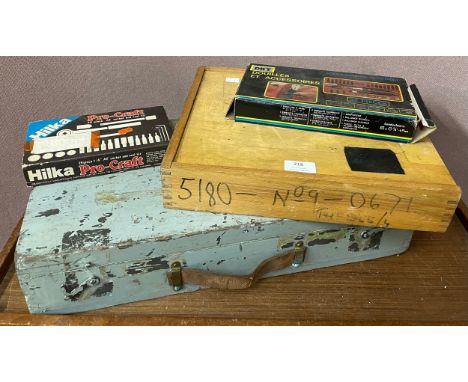 A vintage set of adjustable reamers, boxed and an engineers toolbox with assorted tools