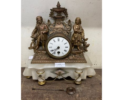 A 19th Century French gilt metal and alabaster figural mantel clock 