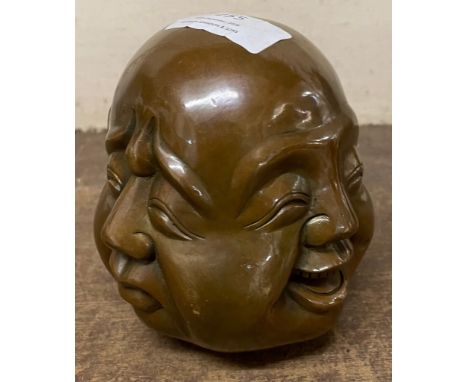 A bronze four face buddha 
