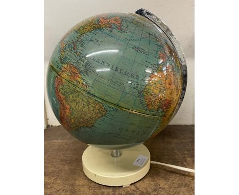 An illuminating table top terrestrial globe 