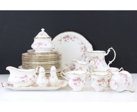 An extensive Paragon Victoriana Rose tea and part dinner service in three boxes to include teacups, saucers, soup bowls, sauc