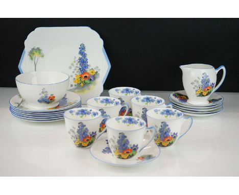 Art Deco Shelley coffee service having a white ground with floral sprays to each and blue rims and handles. The set to includ