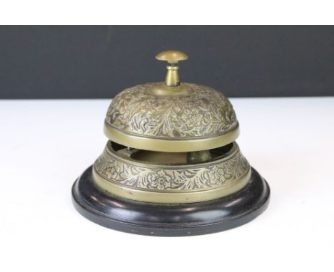 A vintage brass hotel receptionist bell (approx 14.5cm diameter) 