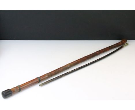 Japanese walking stick with carved figures to the sides, together with an ebonised wood swagger stick having a concordia parv