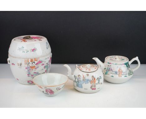 Four pieces of Chinese antique porcelain to include a famille rose tea pot depicting garden scenes, a double handled tea pot 