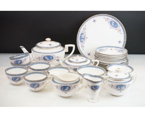 19th Century Victorian Royal Worcester tea service having a white ground with a blue and pink neo classical printed design. T