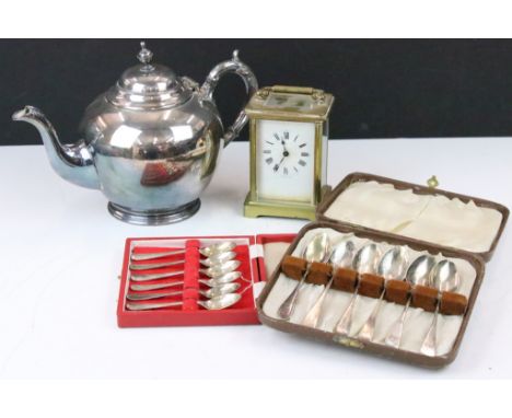 Six silver coffee spoons, makers Cooper Brothers, Sheffield, boxed; five Victorian silver teaspoons, a French carriage clock 