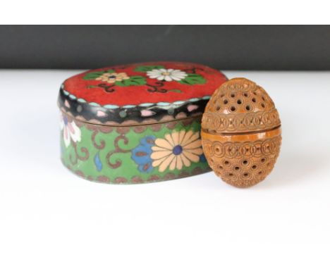 Champleve enamelled trinket box, floral design to lid and body, dimensions approx 9cm x 7cm; tpgether with a carved coquilla 