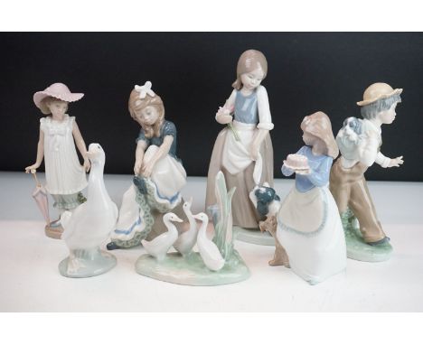 Seven Nao figurines in the their original boxes. The lot to include goose, girl with puppy, girl with cake, girl with parasol