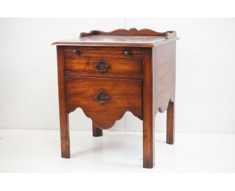 George III Mahogany Tray-Top Commode, later converted to a Chest of Two Drawers with brushing slide and shaped apron, raised 