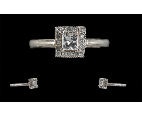 Ladies 14ct White Gold Attractive Diamond Set Dress Ring of Square Form, The Central Princes Cut Diamond of Excellent Colour 