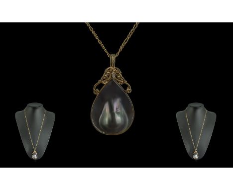 A Contemporary Designed 14ct Gold Diamond and Blister Pearl Set Large Pendant, Attached to a Long 9ct Gold Chain. Pendant Mar