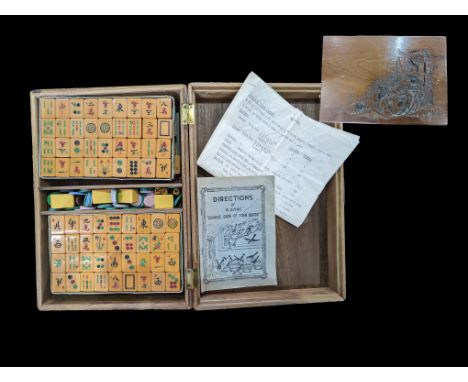 Mahjong Set in Carved Wooden Box, complete with instructions and wooden counter holders.  