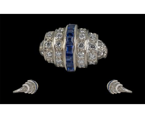 Ladies Excellent Quality Platinum Blue Sapphire and Diamond Set Dress Ring, marked 950 to interior of shank; the princess cut