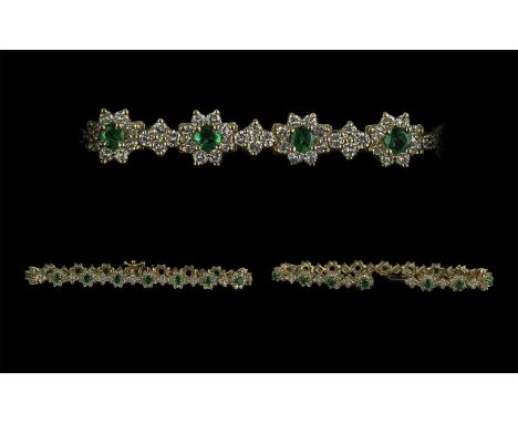 Ladies Superb Quality and Attractive 14ct Gold Diamond and Emerald Set Cluster and Line Bracelet, marked 14ct; the bracelet c