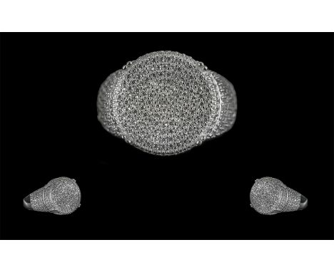 Large Silver Dress Ring Pave-set with hundreds of white round cubic zirconia to the head and shoulders.