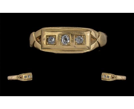 18ct Gold Attractive Three Stone Diamond Set Ring, marked 18ct to shank;  the old cut diamonds of pleasing colour, ring size 