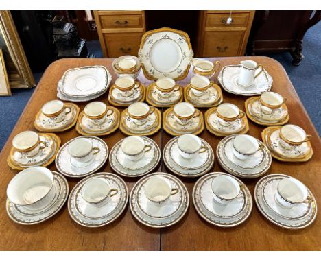 T F & S Limited 'Phoenix' Tea Service, comprising 8 cups, 11 saucers, 12 side plate, two cake plates, milk jug and sugar bowl