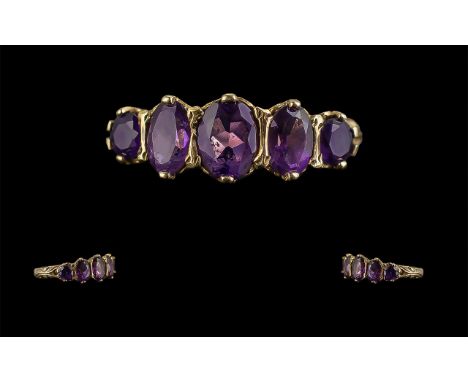 Ladies Attractive 9ct Gold 5 Stone Amethyst Set Ring. Full Hallmark to Shank. The Graduated Well Matched Amethyst of Excellen