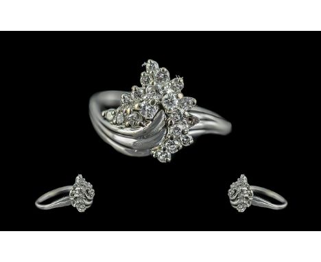 Ladies 18ct White Gold Diamond Set Dress Ring, marked 750 to shank.  The round faceted diamond of good colour and clarity.  E