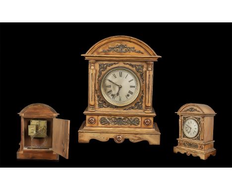 Victorian Mantle Clock, silver dial with Roman numerals, applied brass spandrels, 15" high. 