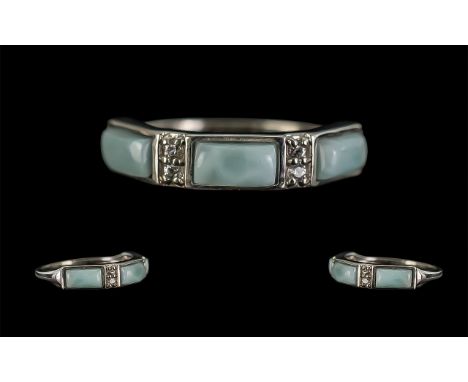 Larimar and Natural Zircon Band Ring, three rectangular larimar stones, accented with sparkling natural zircons, which compli