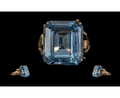 Ladies 9ct Gold Excellent Single Stone Aquamarine Set Statement Ring. Marked 9ct to Interior of Ring. The Large Step-cut Blue