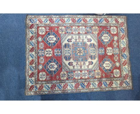 Original Hand Woven Wool Rug, with Aztec design, rectangular shape, central design with outer pattern, measures 210 x 154.
