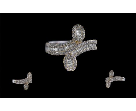 18ct White Gold Good Quality Contemporary Baguette And Brilliant Cut Diamond Set Fashion Ring. Marked 18ct to interior shank,