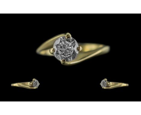 Ladies 18ct Gold Contemporary Single Stone Diamond Set Ring. Full Hallmark to Interior of Shank. The Modern Round Brilliant C