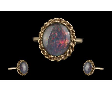 18ct Gold - Pleasing Quality Single Stone Opal Set Ring, Tests High Ct Gold. The Oval Shaped Opal of Good Colours. Ring Size 