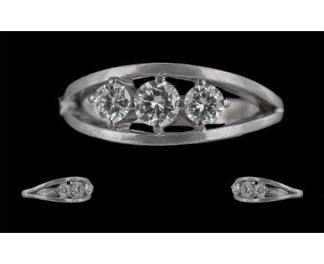 18ct Ladies White Gold 3 Stone Diamond Set Ring. Full Hallmark to interior of shank. The 3 round brilliant cut diamonds are o