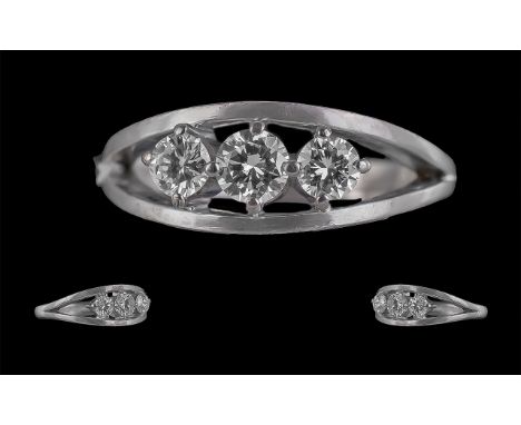 18ct Ladies White Gold 3 Stone Diamond Set Ring. Full Hallmark to interior of shank. The 3 round brilliant cut diamonds are o